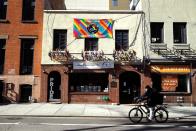 <p>The Stonewall Inn adorns rainbow Pride flags to its exterior earlier this year even with the COVID-19 virus pandemic covering the world.<br></p>