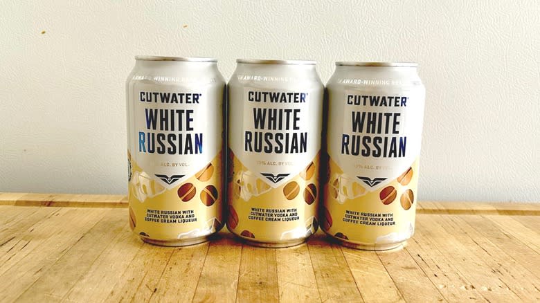 Three Cutwater White Russian cans