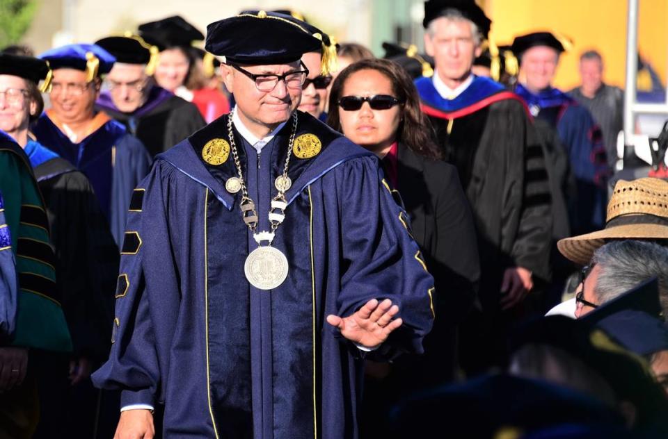 UC Merced Chancellor Dr. Juan Sánchez Muñoz makes his way to the stage during UC Merced’s commencement ceremony on Friday, May 12, 2023. Shawn Jansen/Sjansen@mercedsun-star.com