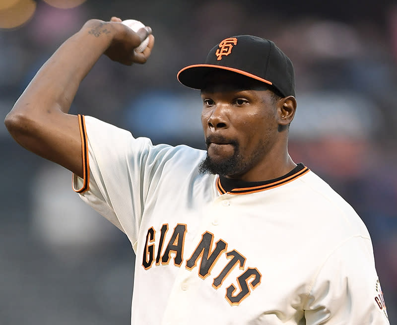 Kevin Durant throws out the ceremonial first pitch prior to the start of the game between the St. Louis Cardinals and San Francisco Giants at AT&T Park on Sept. 16, 2016. (Getty Images)