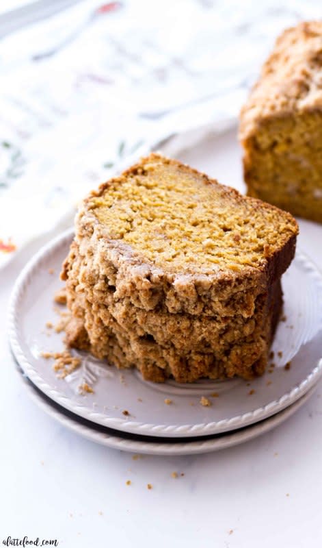 <p>A Latte Food</p><p>This easy pumpkin bread recipe is topped with a brown sugar crumb topping. Full of pumpkin flavor and rich pumpkin spice, this moist pumpkin bread is a fall staple! </p><p><strong>Get the recipe: <em><a href="https://www.alattefood.com/easy-pumpkin-bread-with-crumb-topping/" rel="nofollow noopener" target="_blank" data-ylk="slk:Easy Pumpkin Bread with Crumb Topping;elm:context_link;itc:0;sec:content-canvas" class="link ">Easy Pumpkin Bread with Crumb Topping</a></em></strong></p>