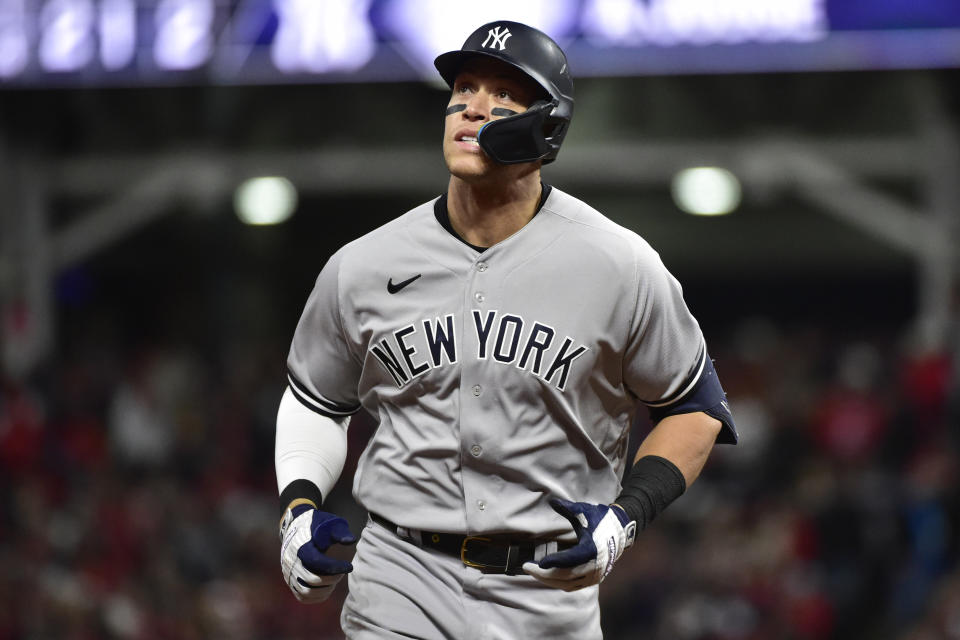 New York Yankees' Aaron Judge runs the bases after his home run in the third inning of Game 3 of the baseball team's AL Division Series against the Cleveland Guardians, Saturday, Oct. 15, 2022, in Cleveland. (AP Photo/Phil Long)