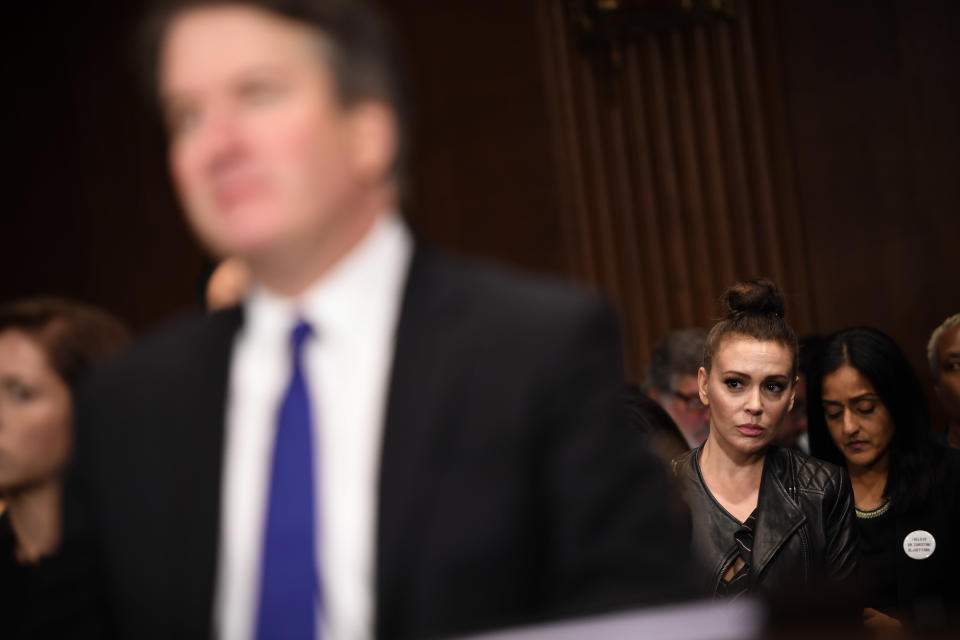 Actress Alyssa Milano (second from right), a prominent figure in the Me Too movement, listens to Kavanaugh.