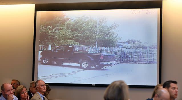 A photograph of the truck, in which Conrad Roy III killed himself, is projected during testimony in the trial of Michelle Carter. Picture: AP