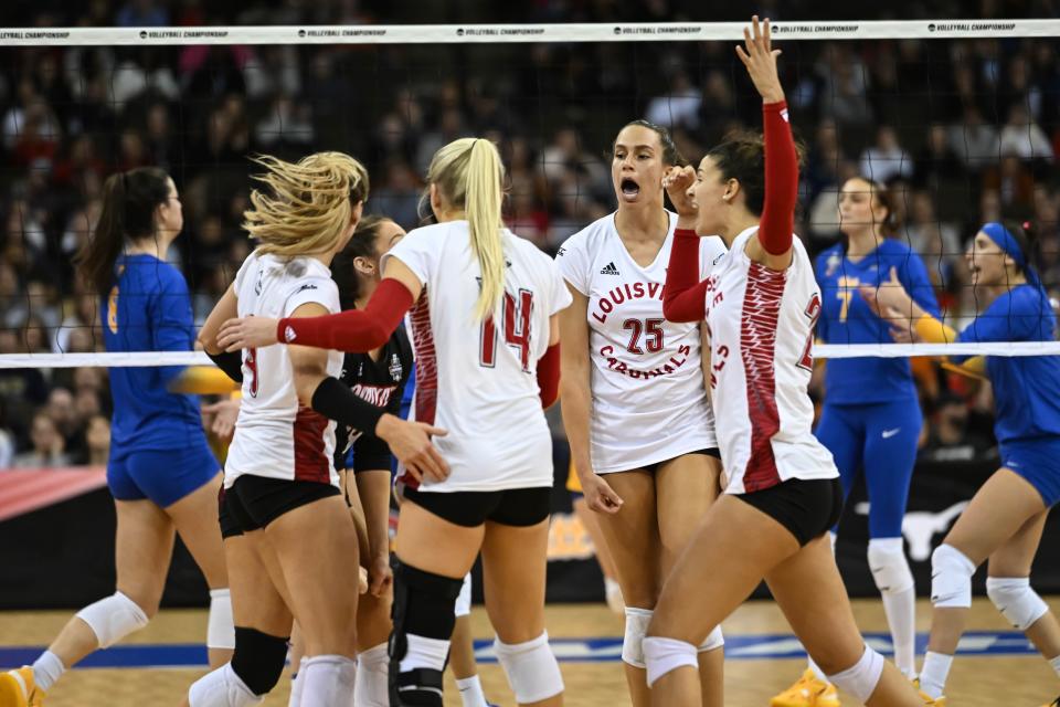 Louisville Cardinals Amaya Tillman (25) and teammates celebrate a point against the Pittsburgh Panthers in the semi-final match at CHI Health Center.