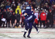 <p>Toronto prevailed over Calgary in a thrilling and snowy Grey Cup final. (Paul Chiasson/CP) </p>