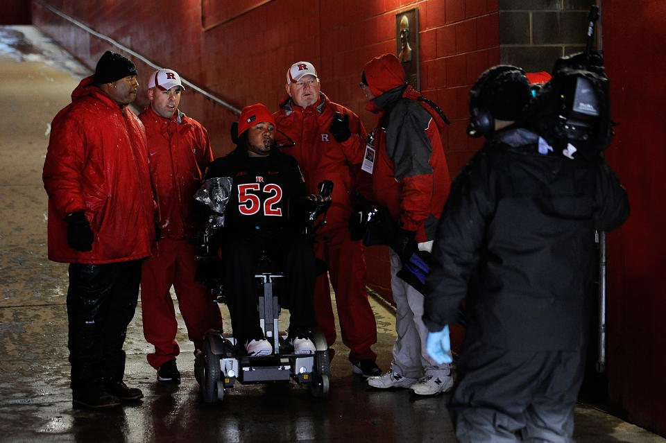 NEW BRUNSWICK, NJ - OCTOBER 29: Former Rutgers football player Eric LeGrand #52 prepares to lead the Rutgers Scarlet Knights onto the field before a game against West Virginia Mountaineers at High Point Solutions Stadium on October 29, 2011 in New Brunswick, New Jersey. LeGrand was paralyzed during a kickoff return in October 2010. (Photo by Patrick McDermott/Getty Images)