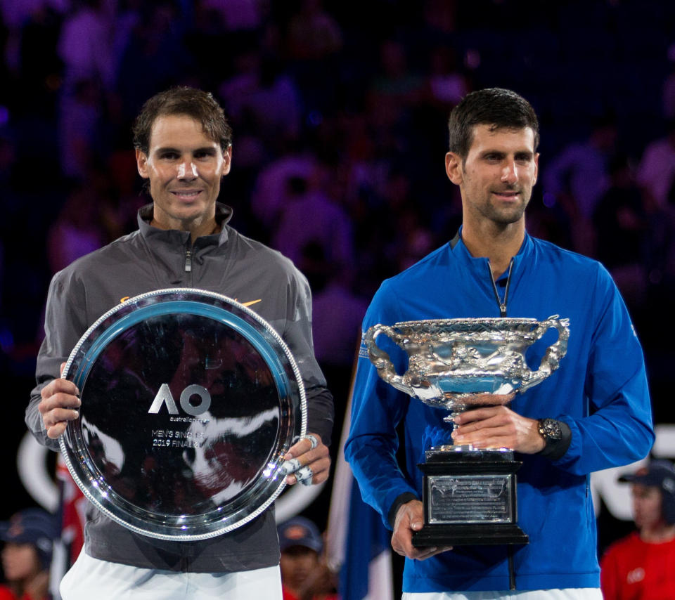 Novak Djokovic poses next to Rafa Nadal at the Australian Open.