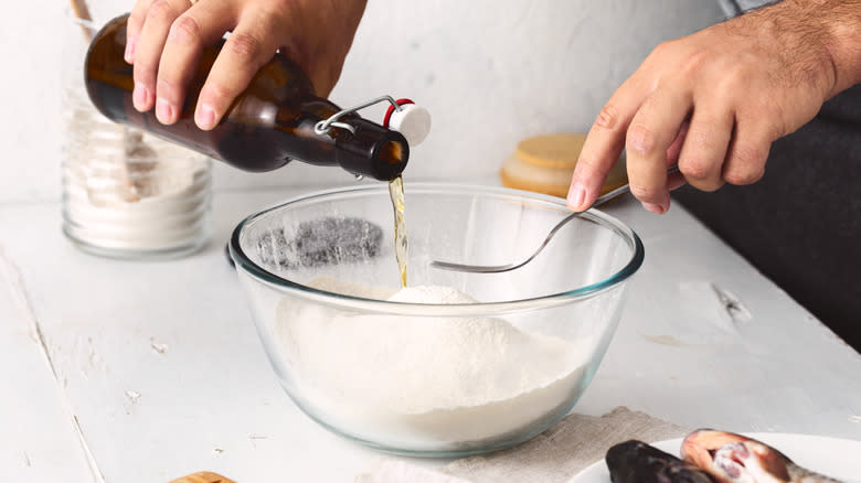 Person making beer batter