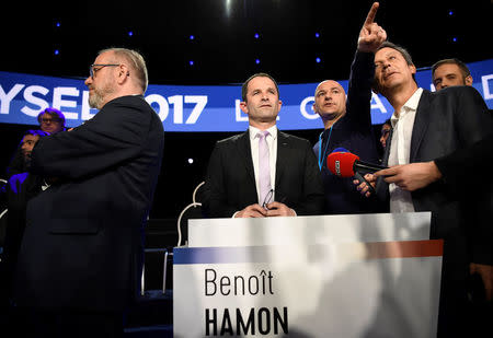 Benoit Hamon of the French Socialist party arrives at the television studio where the eleven candidates will attend a prime-time televised debate for the French 2017 presidential election in La Plaine Saint-Denis, near Paris, France, April 4, 2017. REUTERS/Lionel Bonaventure/Pool