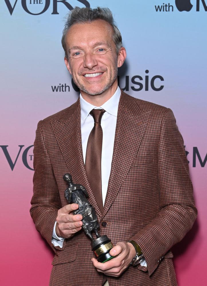 Fraser T Smith with the best contemporary song trophy he won with Dave at the Ivor Novello Awards on 21 September.