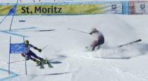 Alpine Skiing - FIS Alpine Skiing World Championships - Alpine Team Event - St. Moritz, Switzerland - 14/2/17 - Phil Brown of Canada skis out in the parallel slalom against Aj Ginnes of the USA during the Mixed Team event. REUTERS/Denis Balibouse