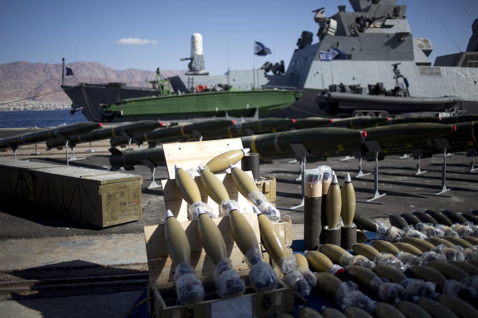 Dozens of mortar shells and rockets are on display after being seized from the Panama-flagged KLOS C civilian cargo ship that Israel intercepted last Wednesday off the coast of Sudan, at a military port in the Red Sea city of Eilat, southern Israel, Monday, March 10, 2014. Israel has alleged the shipment was orchestrated by Iran and was intended for Islamic militants in Gaza, a claim denied by Iran and the rockets' purported recipients. Questions remain, including how the rockets would have been smuggled into Gaza, largely cut off from the world by a border blockade enforced by Israel and Egypt. (AP Photo/Ariel Schalit)