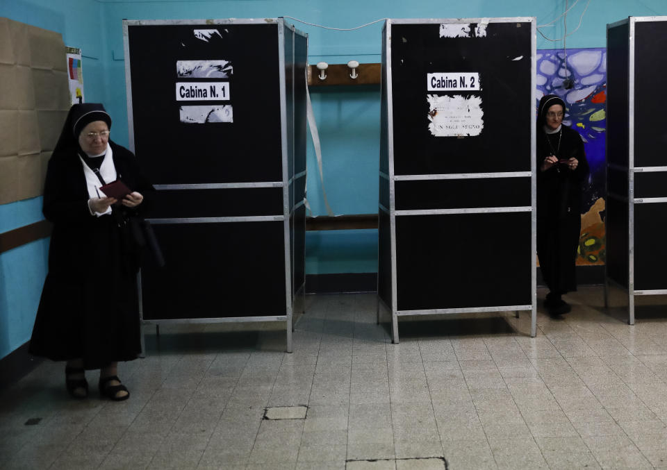 Two Catholic nuns vote at a polling station in Rome, Sunday, May 26, 2019. Pivotal elections for the European Union parliament reach their climax Sunday as the last 21 nations go to the polls and results are announced in a vote that boils down to a continent-wide battle between euroskeptic populists and proponents of closer EU unity. (AP Photo/Alessandra Tarantino)