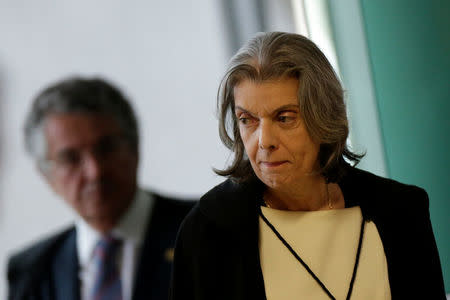 Brazil's Supreme Court President Carmen Lucia walks near Judge Marco Aurelio Mello during a session of the Supreme Court, in Brasilia, Brazil March 21, 2018. REUTERS/Ueslei Marcelino