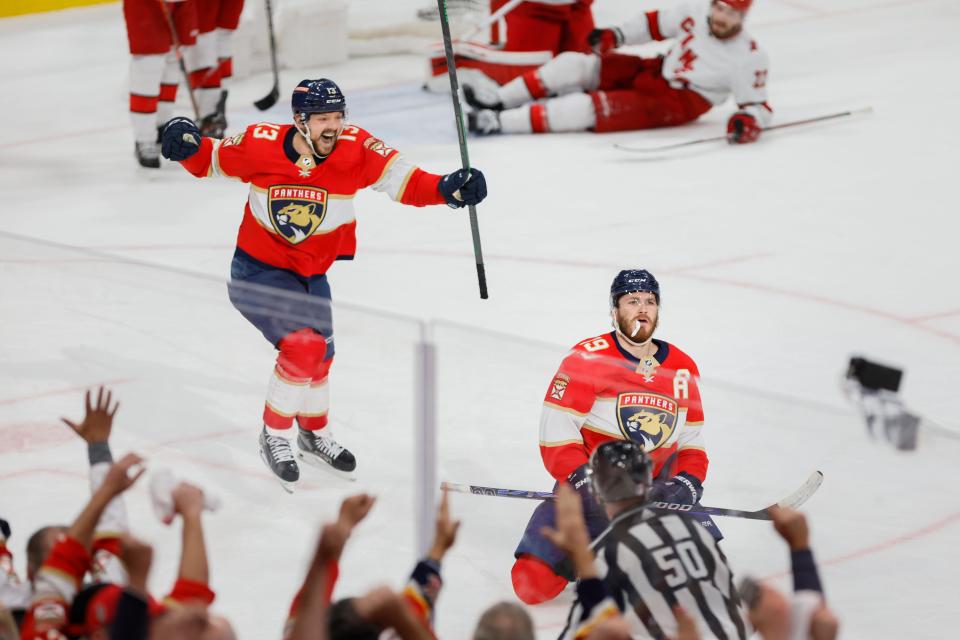 May 24, 2023;  Sunrise, Florida, USA;  Florida Panthers left wing Matthew Tkachuk (19) celebrates with center Sam Reinhart (13) after scoring the game-winning goal against the Carolina Hurricanes during the third period in game four of the Eastern Conference Finals of the 2023 Stanley Cup Playoffs at FLA Live Arena. .  Mandatory Credit: Sam Navarro-USA TODAY Sports