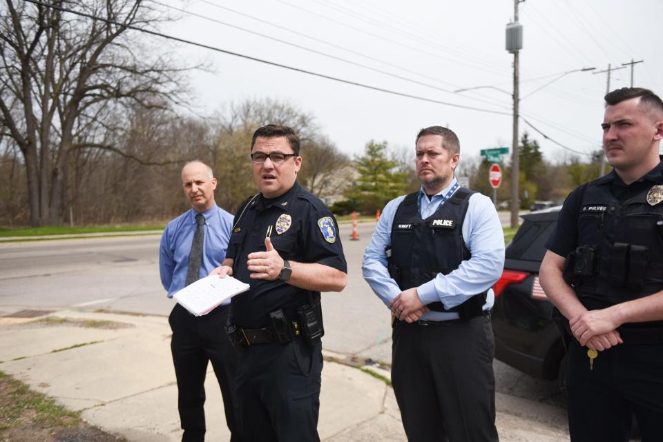 Lansing Police Chief Ellery Sosebee speaks during a press conference, Wednesday, April 10, 2024, near West Holmes Road and Simken Drive. Also pictured are Lansing Mayor Andy Schor, left, Capt. Matthew Kreft, and Officer Damon Pulver.