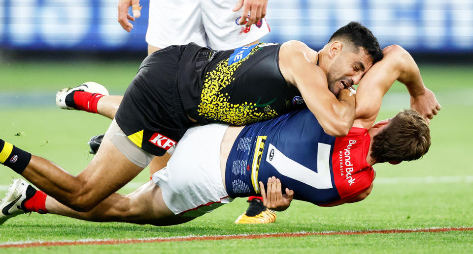 Richmond's Marlion Pickett tackles Melbourne Demons star Jack Viney during their round seven AFL clash at the MCG. Pic: Getty