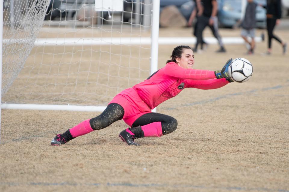 Pueblo Central's Ellen Ferris blocks a shot on goal during a matchup with Pueblo Centennial on March 14.