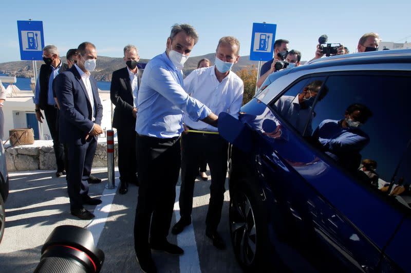 Greek PM Mitsotakis and Volkswagen AG CEO Herbert Diess attend a delivery ceremony of electric cars in the island of Astypalea