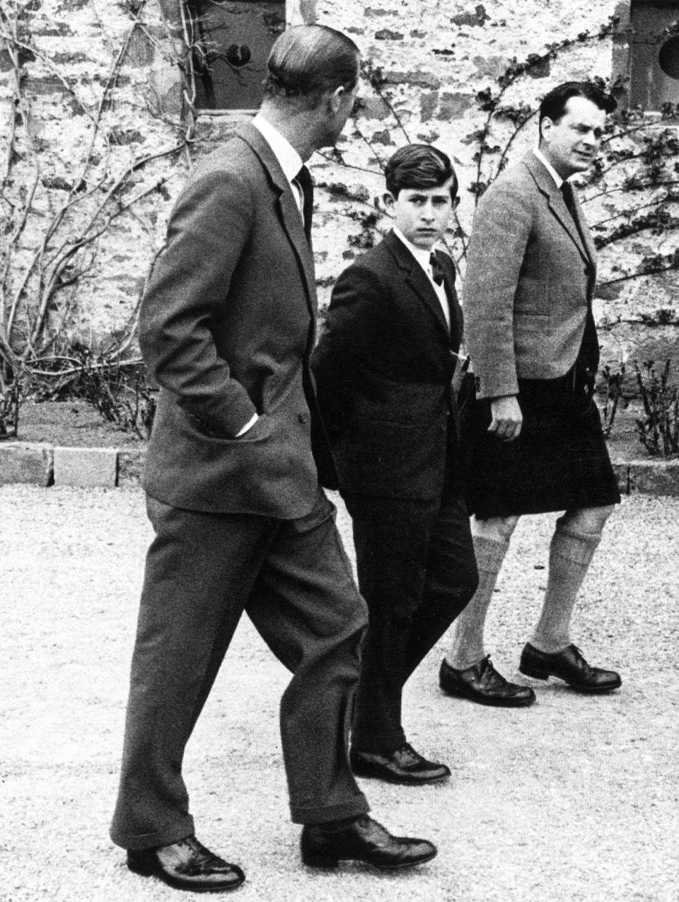 Prince Philip accompanies Charles as he begins his stint at Gordonstoun School. (Getty Images)