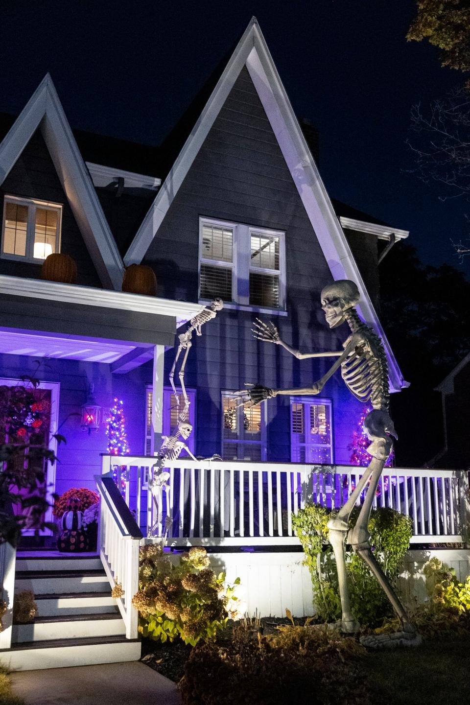 Tall skeletons outside of the Herzig house in Pleasant Ridge on Tuesday, Oct. 24, 2023.
