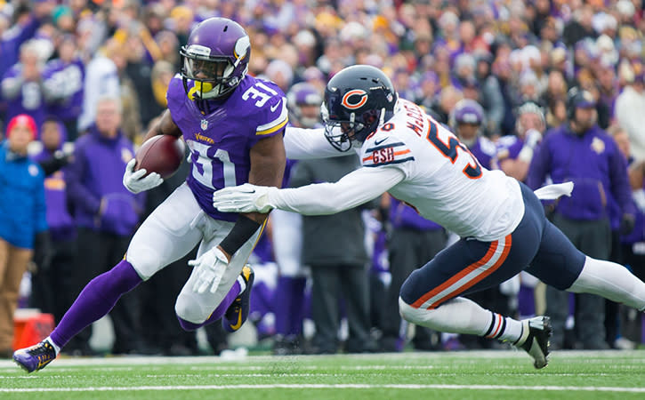 Minnesota Vikings running back Jerick McKinnon runs after the catch in the second quarter against the Chicago Bears.