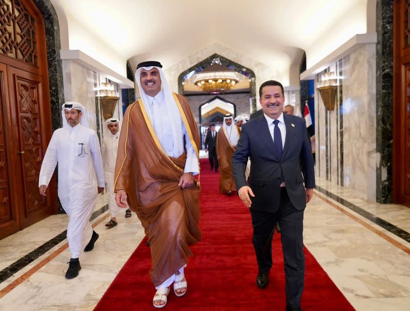 Iraqi Prime Minister Mohammed Shia al-Sudani welcomes Qatar's Emir Sheikh Tamim bin Hamad al-Thani, in Baghdad