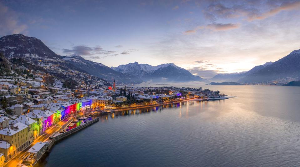 christmas lights on buildings of domaso, lake como, italy