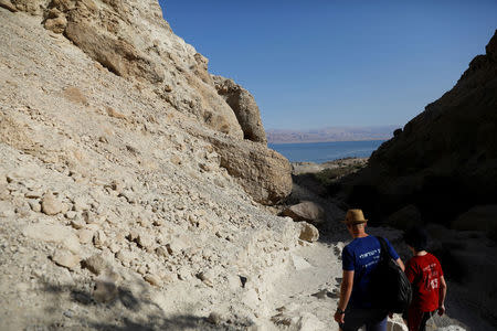 People visits Nahal David in the Ein Gedi Nature Reserve area, near the Dead Sea, Israel October 1, 2017. REUTERS/Ronen Zvulun