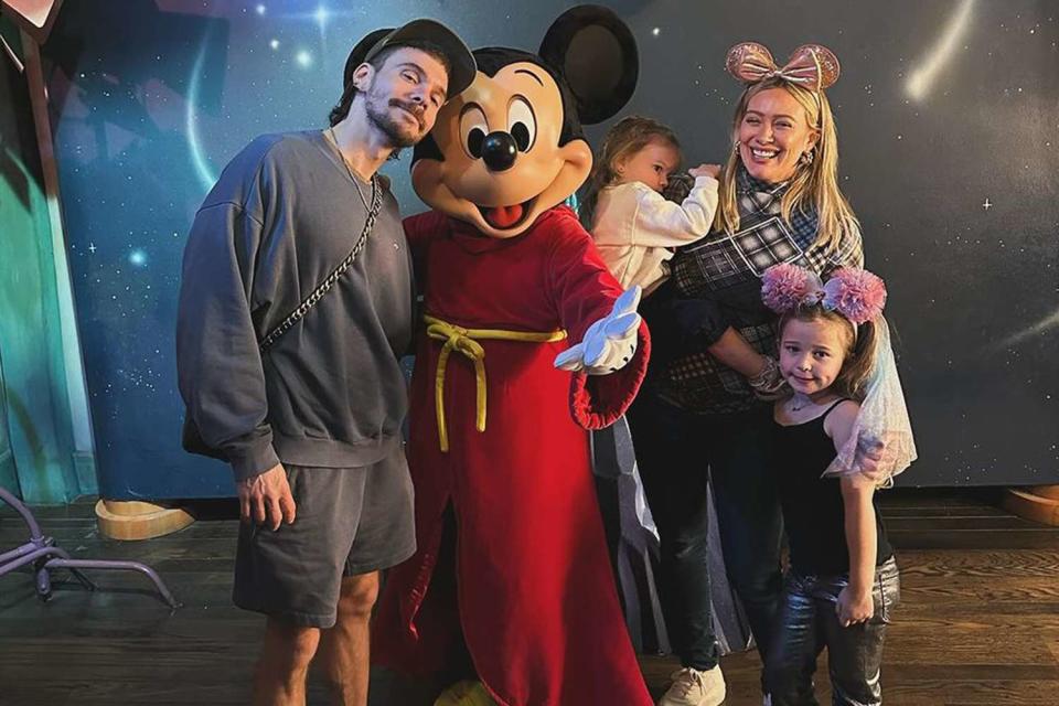 <p>Hilary Duff Instagram</p> From left: Matthew Koma, Mae James, Hilary Duff and Banks Violet at Disneyland in an Instagram photo on Dec. 13, 2023
