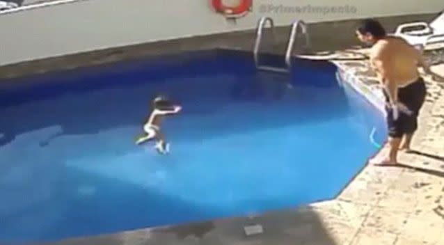 On the footage he can be seen throwing the toddler into the pool then walking away while the child struggles to float and swim. Source: Supplied.