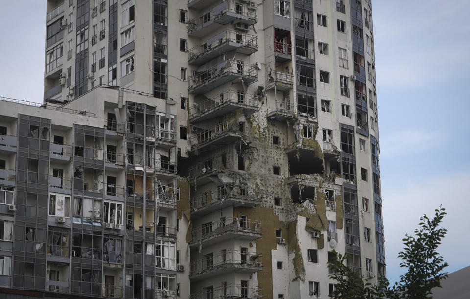 An apartment building damaged in the Russian missile attack in Kharkiv, Ukraine, Tuesday, May 14, 2024. (AP Photo/Andrii Marienko)