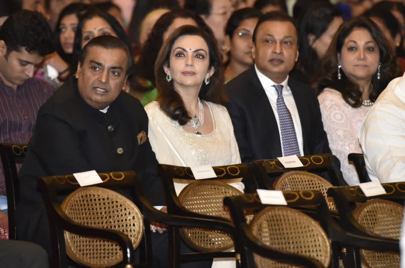 Mukesh Ambani, his wife Nita Ambani, brother and Chairman of Reliance Group Anil Ambani and his wife Tina Ambani.