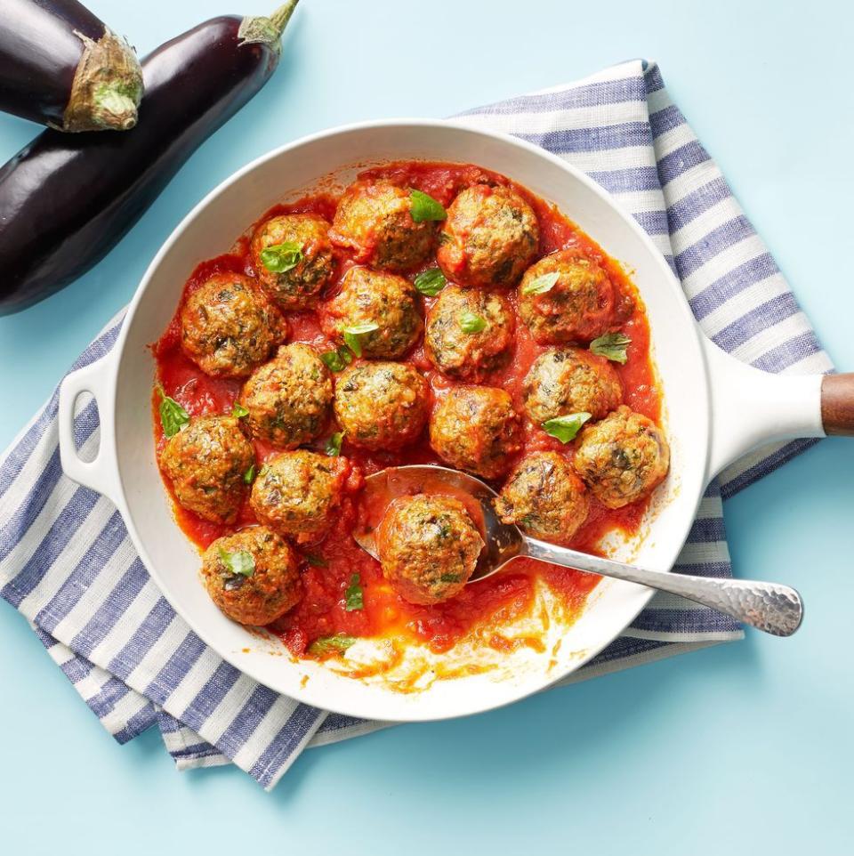 <p>This vegetarian Super Bowl snack is like your favorite eggplant parm in an easy-to-eat meatball form. </p><p>Get the <a href="https://www.womansday.com/food-recipes/a34993979/eggplant-parmesan-meatballs-recipe/" rel="nofollow noopener" target="_blank" data-ylk="slk:Eggplant Parmesan Meatballs recipe;elm:context_link;itc:0;sec:content-canvas" class="link "><strong>Eggplant Parmesan Meatballs recipe</strong></a> from Woman's Day. </p>