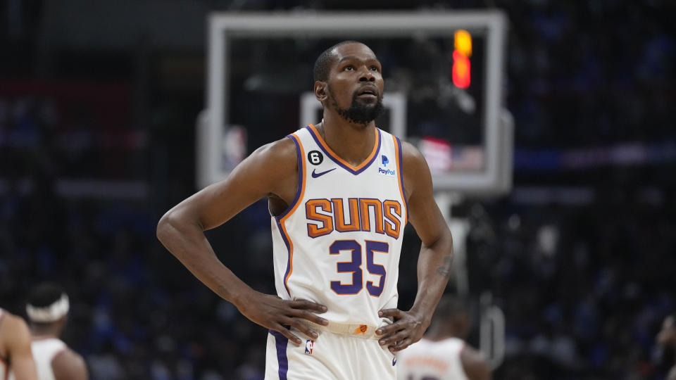 FILE - Phoenix Suns forward Kevin Durant (35) walks on the court during the first half of of Game 3 of a first-round NBA basketball playoff series against the Los Angeles Clippers in Los Angeles, Thursday, April 20, 2023. Kevin Durant and Nike have agreed to a lifetime contract, making him just the third NBA player to receive such a deal, joining Michael Jordan and LeBron James. (AP Photo/Ashley Landis, File)