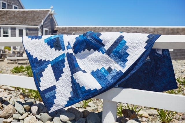 This blue and white quilt made by several members of the guild will be raffled off at this year's quilt show in Marshfield.