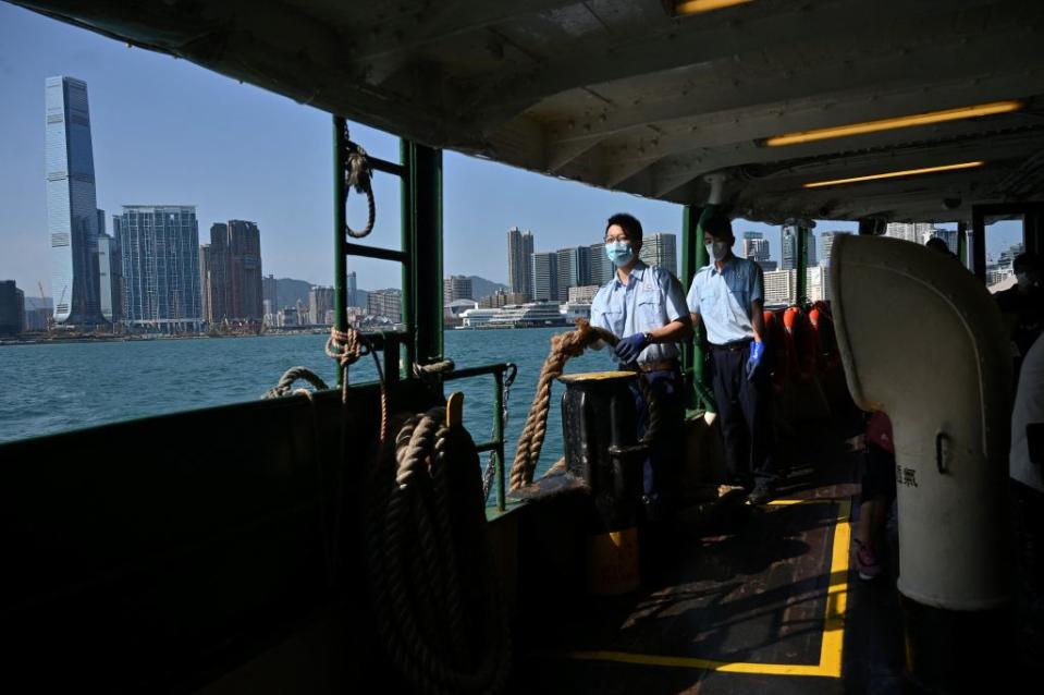 A Star Ferry prepares to dock in Central on Victoria Harbour in Hong Kong on May 4, 2022. The Star Ferry, which traces its origins back to the 1880s, has struggled financially to keep afloat after tourist arrivals in the southern Chinese city plummeted<span class="copyright">PETER PARKS/AFP via Getty Images</span>