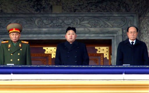 This handout picture taken by North Korea's official Korean Central News Agency on December 29, shows Kim Jong-Un (C) with head-of-state Kim Yong-Nam (R) attending the mourning service for late North Korea leader Kim Jong-Il in Pyongyang. North Korea said Kim Jong-Un had assumed the "supreme commandership" of the reclusive nation's million-strong military, state media reported Saturday