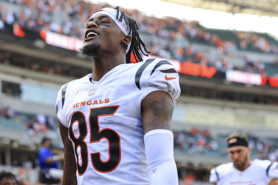 Cincinnati Bengals wide receiver Tee Higgins (85) reacts as he walks off the field after an NFL football game against the Minnesota Vikings, Sunday, Sept. 12, 2021, in Cincinnati. The Bengals won 27-24. (AP Photo/Aaron Doster)