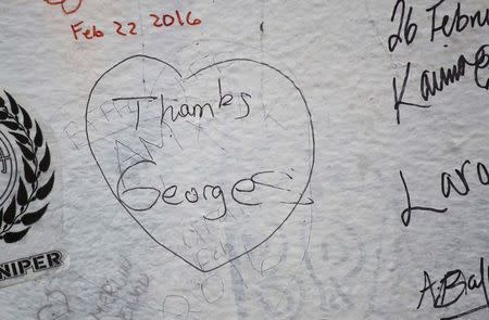 A tribute to music producer George Martin is seen outside the Abbey Road recording studios in London, Britain March 9, 2016. REUTERS/Neil Hall