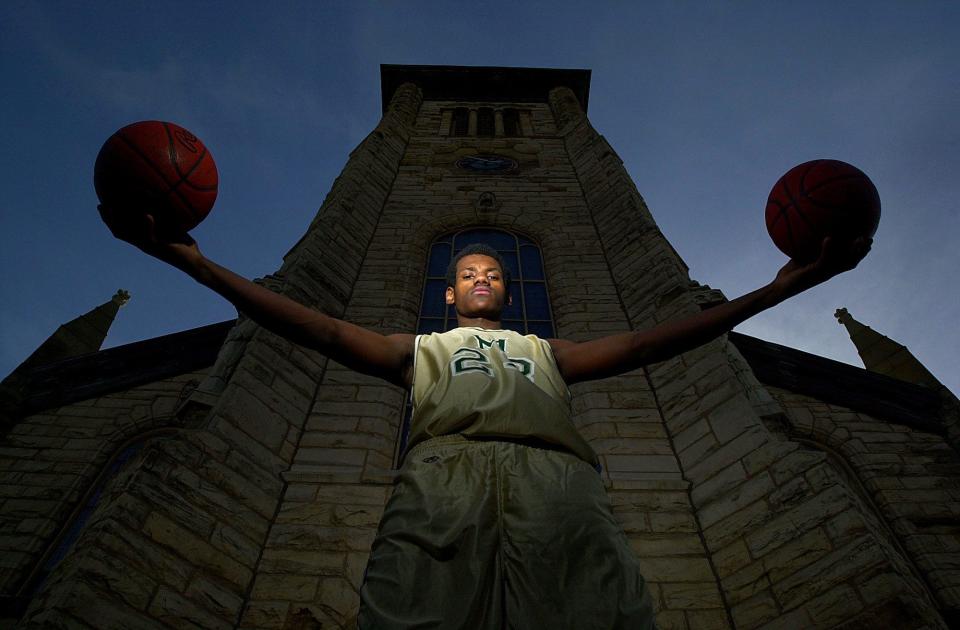 LeBron James poses March 19, 2001, as the Beacon Journal District Player of the Year during his sophomore season at St. Vincent-St. Mary High School.