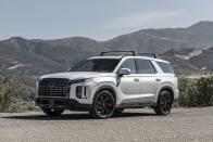 <p>The Hyundai Palisade is the Kia Telluride's fraternal twin—sharing a platform, powertrain, and suspension—but its looks, inside and out, are where the two are most different. We think the Telluride has an advantage where looks are concerned, but the Palisade is still the next-best choice if your local Kia dealership is out of stock. The fit-and-finish quality are in stark contrast to many of the competitors in this segment. Second-row ventilated seats and a suede-like headliner for under $49,000? You can't get that combo in a Cadillac Escalade for $103,000.</p><ul><li>Base price: $33,860</li><li><em>C/D </em>rating: 9.5/10</li></ul><p><a class="link " href="https://www.caranddriver.com/hyundai/palisade/" rel="nofollow noopener" target="_blank" data-ylk="slk:MORE ABOUT THE PALISADE;elm:context_link;itc:0;sec:content-canvas">MORE ABOUT THE PALISADE</a></p>