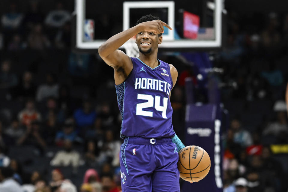 Charlotte Hornets forward Brandon Miller (24) brings the ball up during the first half of the team's NBA basketball game against the Atlanta Hawks, Wednesday, Feb. 14, 2024, in Charlotte, N.C. (AP Photo/Matt Kelley)