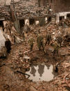 <p>Damage in the yard of the home of vet and blacksmith Mr T.H. Walden in East Street off Albert Street, King’s Lynn, following a Zeppelin raid which took place on 19th January 1915. (Tom Marshall/mediadrumworld.com) </p>