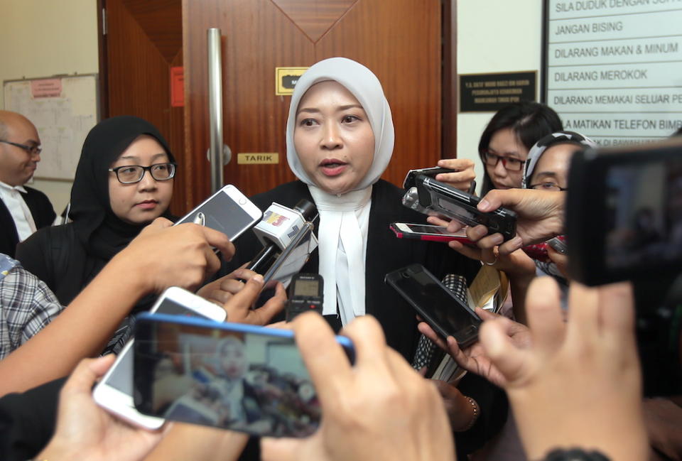 Deputy Public Prosecutor Ainul Wardah Shahidan speaks to reporters outside the High Court in Ipoh November 19, 2019. — Picture by Farhan Najib