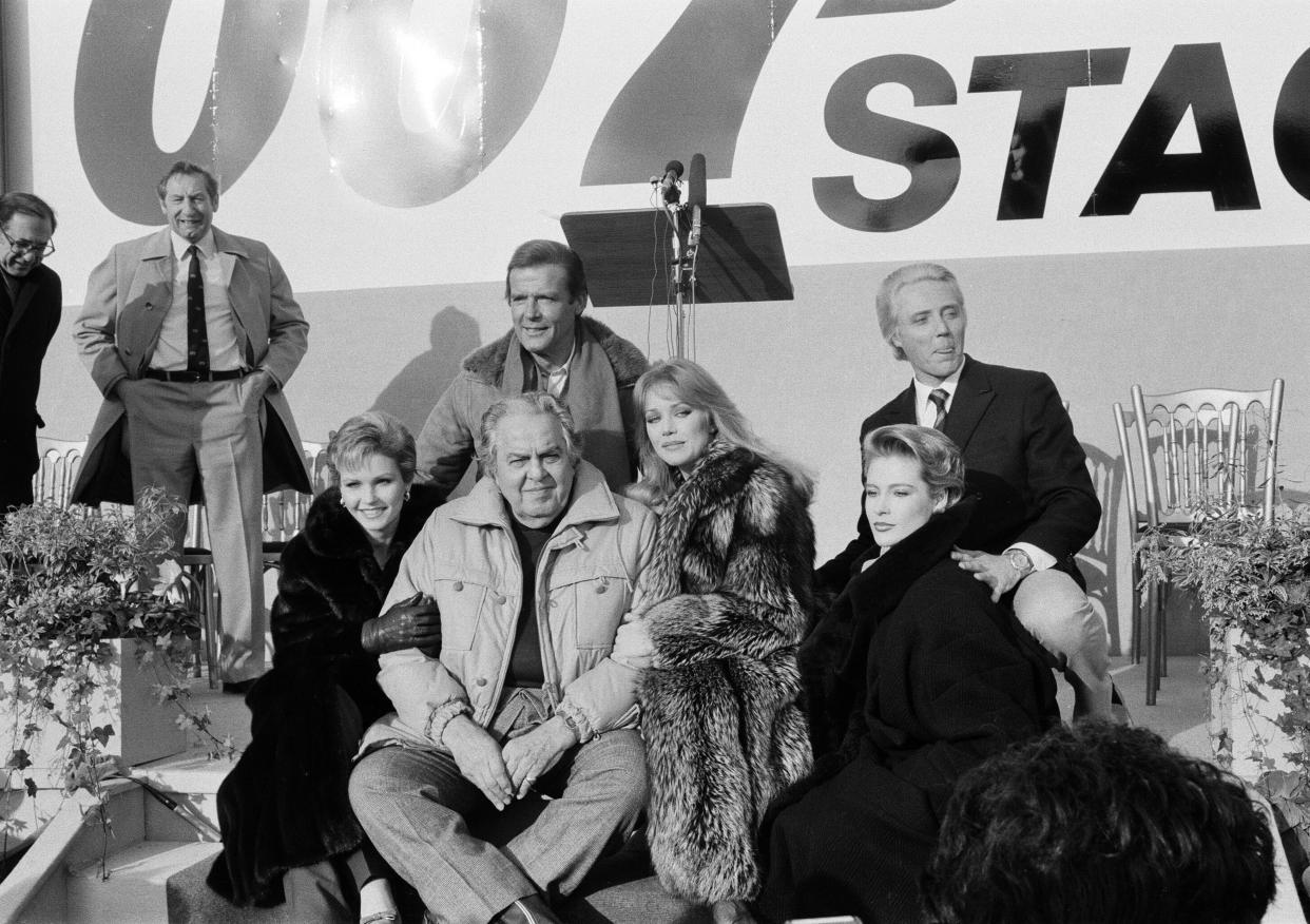 The opening of the world's largest silent film stage at Pinewood Studios, the original stage was completely destroyed by fire. James Bond star Roger Moore is pictured with Cubby Broccoli, ahead of the newest Bond production 'A View to a Kill'. 7th January 1985. (Photo by Kent Gavin/Mirrorpix/Getty Images)