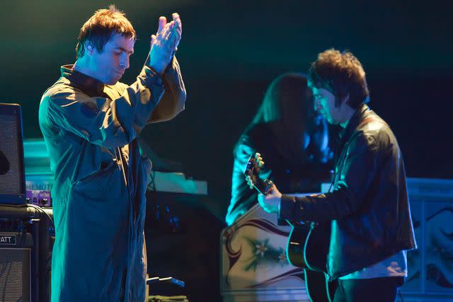 <p>Marco Prosch/Getty </p> Liam Gallagher and Noel Gallagher of Oasis perform live at the Melt! Festival in Ferropolis in July 2009