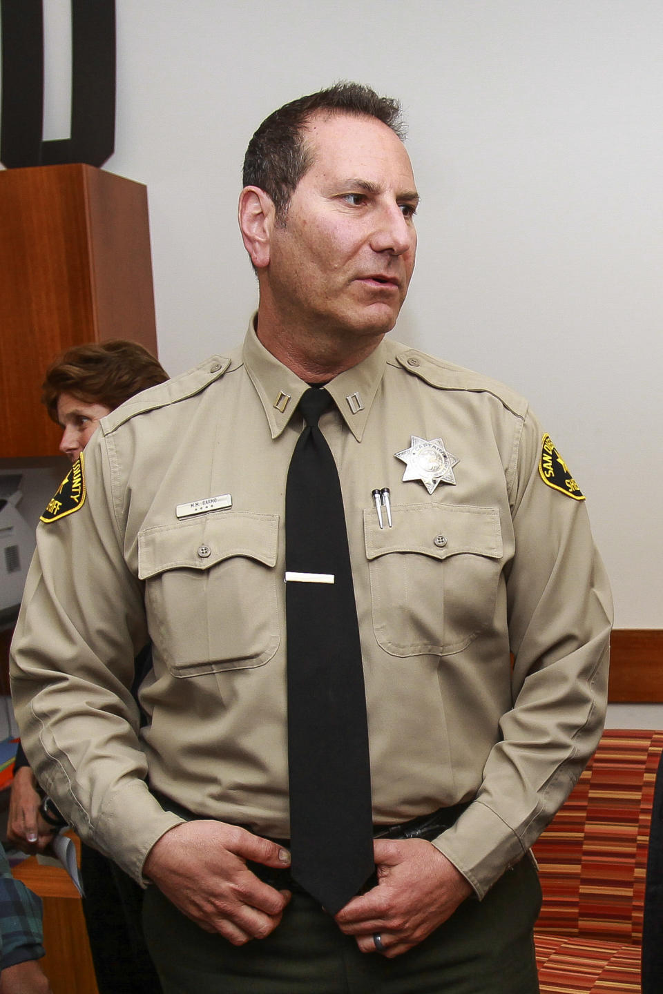 In this April 13, 2016 image, Former San Diego County Sheriff's Capt. Marco Garmo is seen in San Diego. Federal agents have arrested Garmo along with a deputy and several others in connection to gun trafficking. (Hayne Palmour IV/The San Diego Union-Tribune via AP)