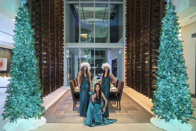 <p>Vera Wang /Instagram</p> Vera Wang and her daughters, Josephine Becker (left) and Cecilia Becker (right), wear festive Christmas gowns
